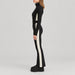 Cordova women's Cordova OTB Ski Suit in Onyx – model side view – London Ski Co
