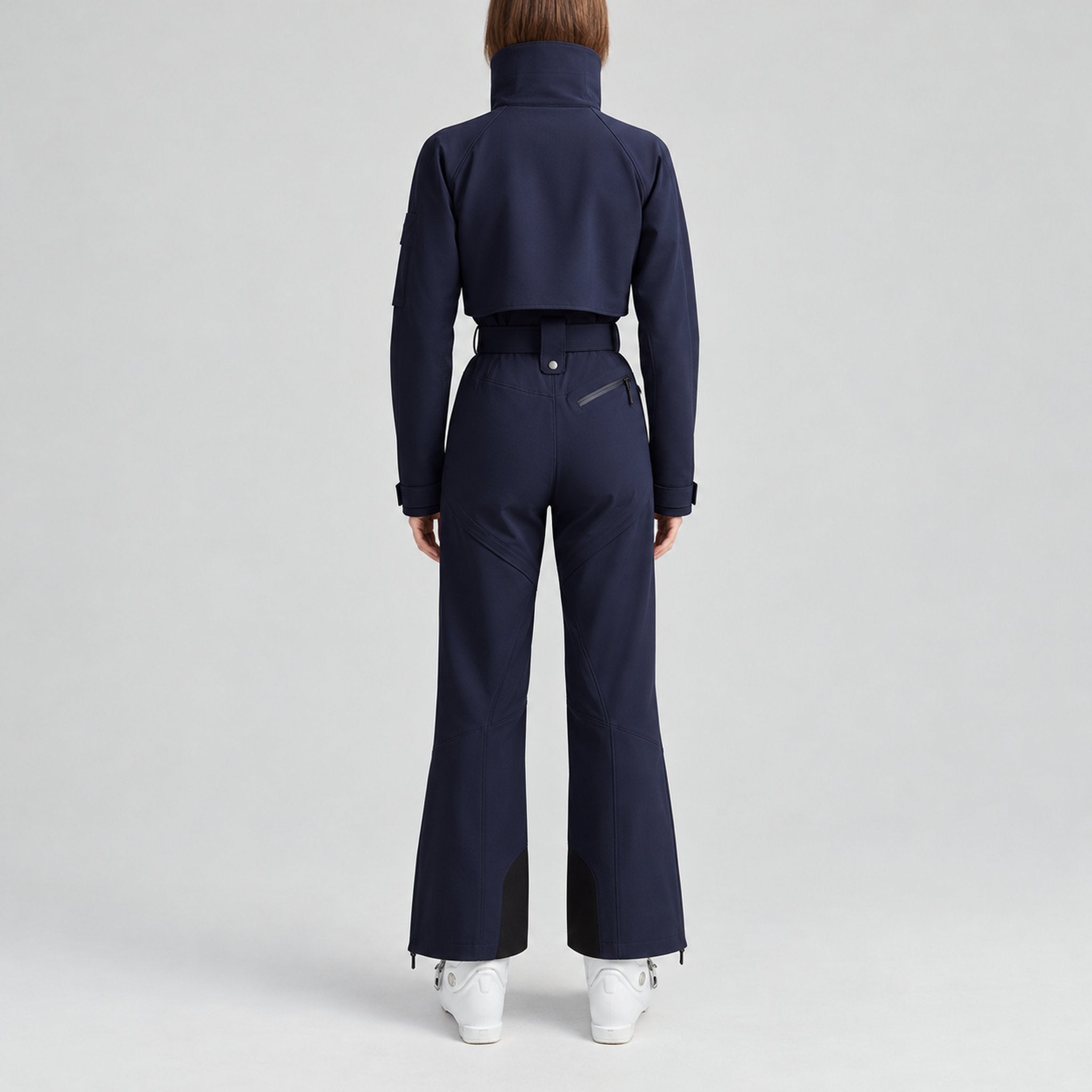 Cordova women's Volta Ski Suit in Indigo – model back view – London Ski Co