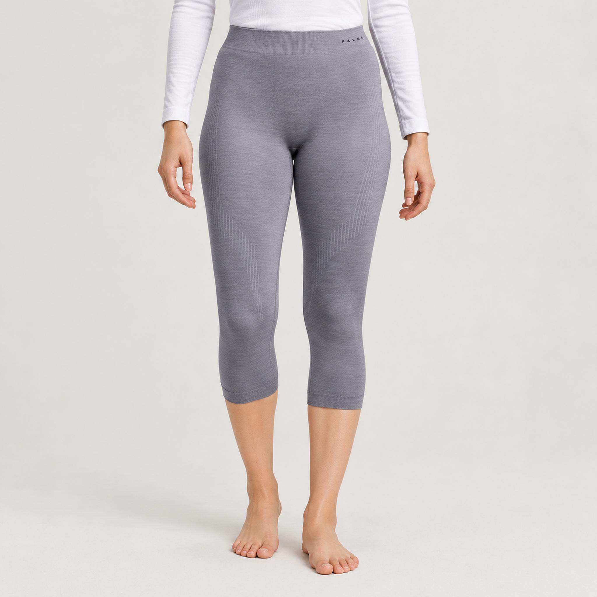 Falke women's Wool Tech 3/4 Leggings in Grey – model front
