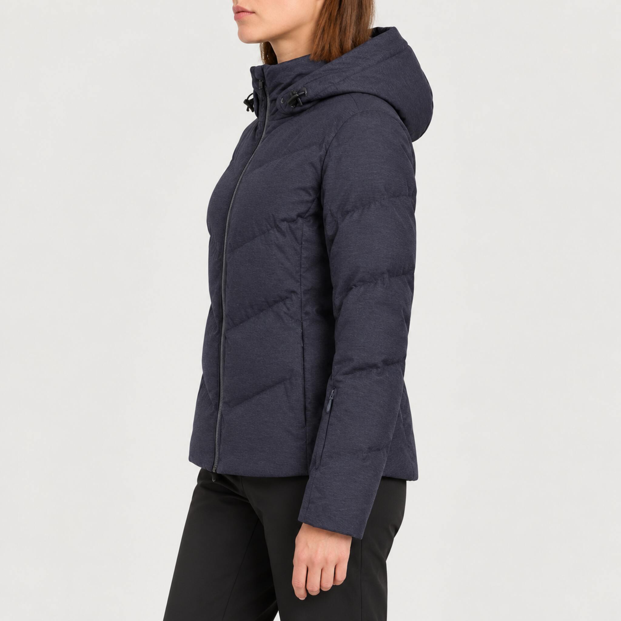 Fera women's Amy Ski Jacket in Indigo, side view on model.