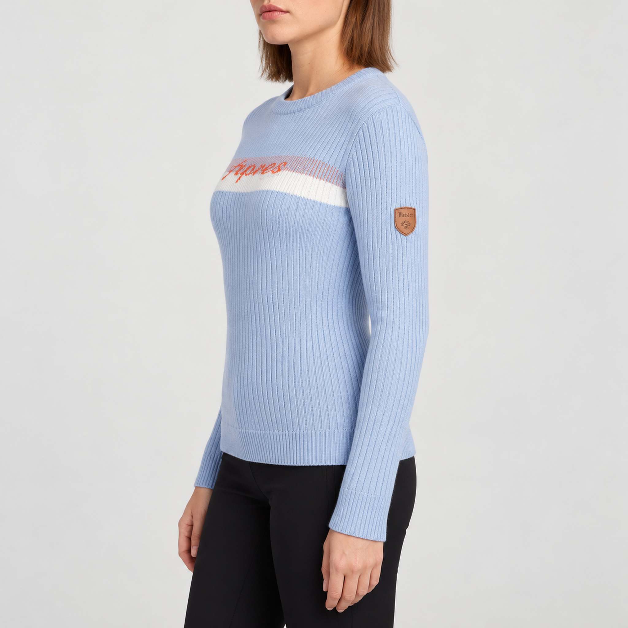 Fera women's Apres Sweater in Sky Blue, left side on model.