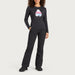 Fera women's Goggle Tee in Black, full outfit on model.