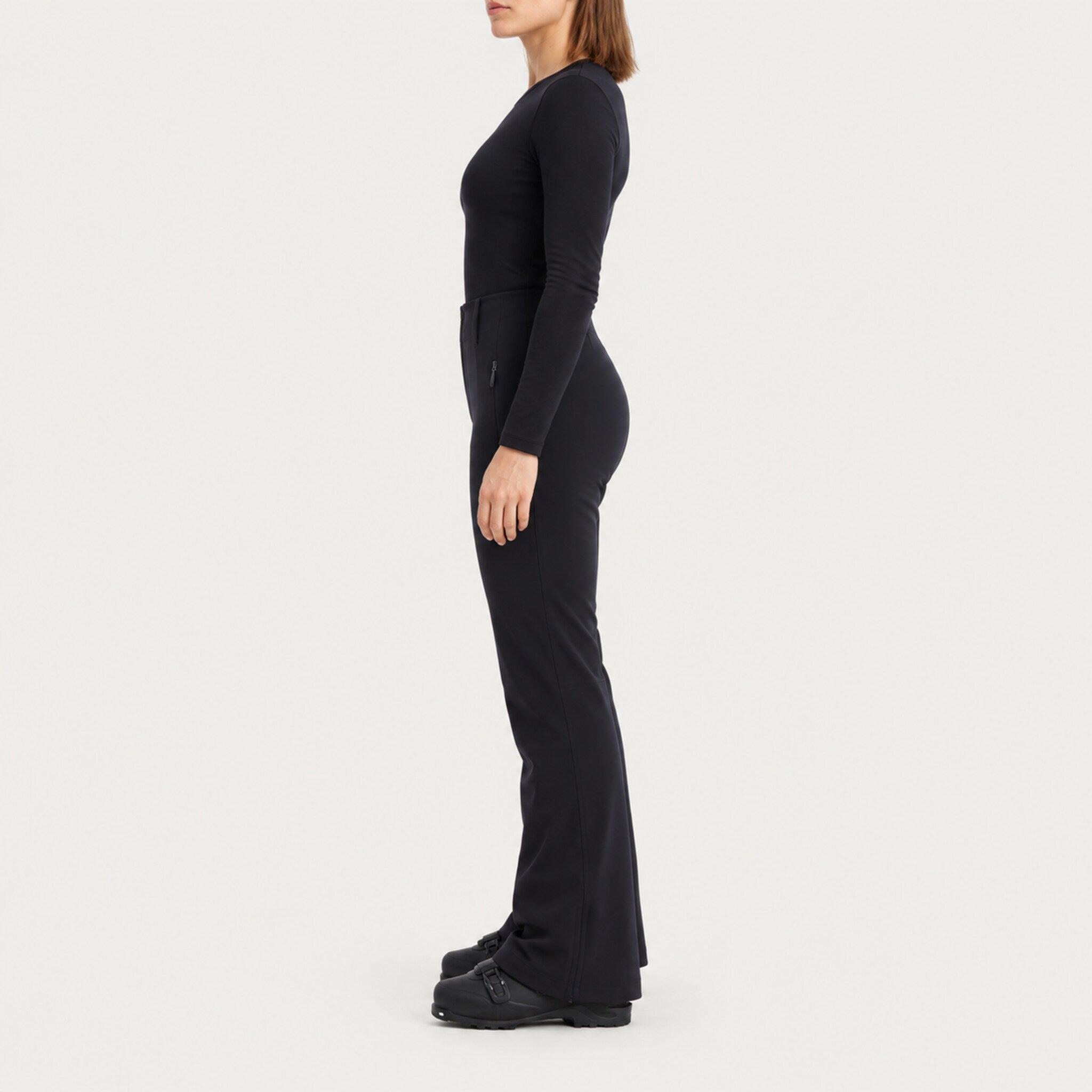 Fera women's High Heaven Pant in Black, side view on model.