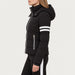 Fera women's Kate Ski Jacket in Black, side view on model.