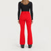 Fera women's Kelly Pant in Red, back view on model.