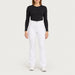 Fera women's Kelly Pant in White, front view on model.