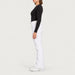 Fera women's Kelly Pant in White, side view on model.