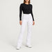 Fera women's Kelly Pant in White, full outfit on model.