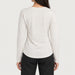 Fera women's Martini Run Tee in Ivory, back view on model.