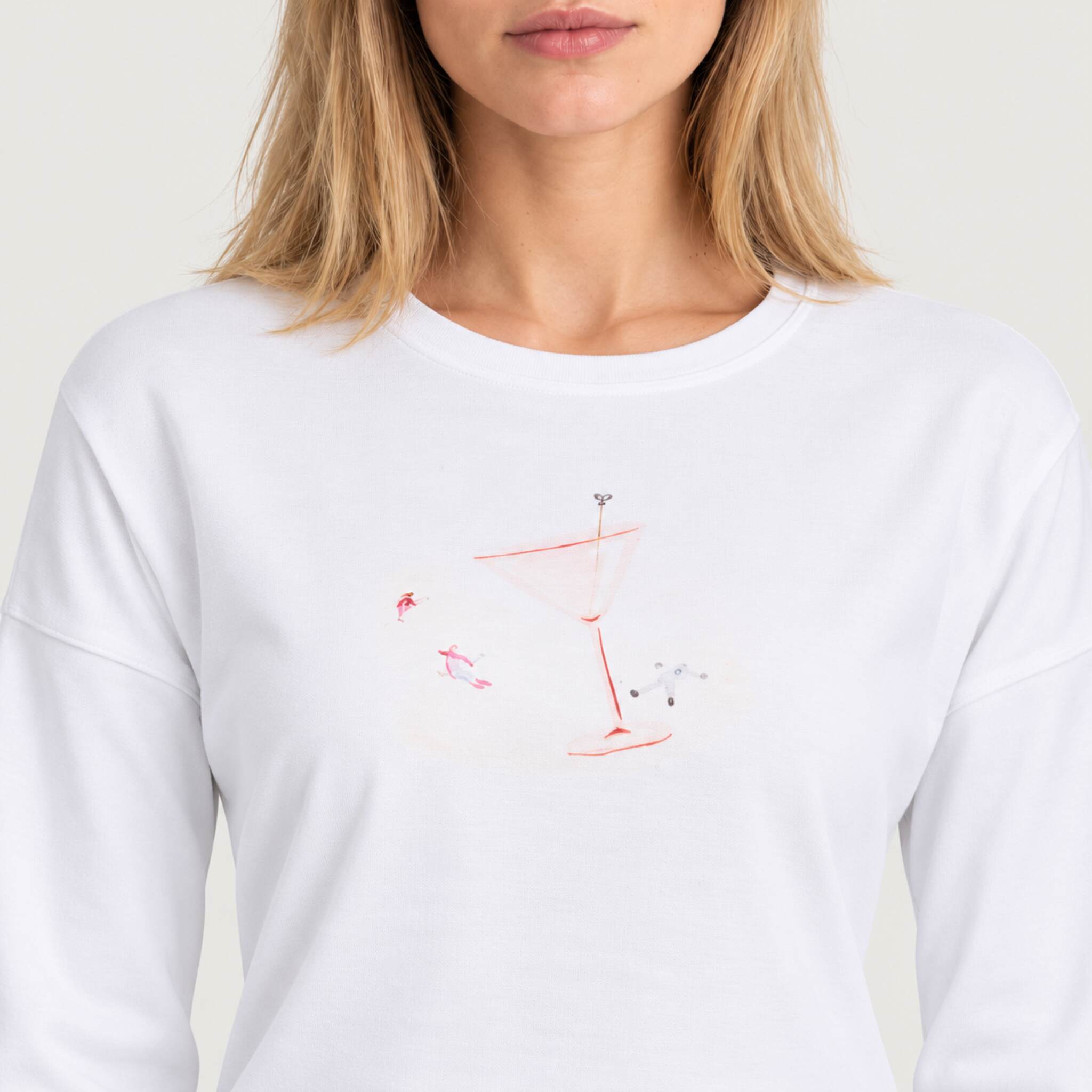 Fera women's Martini Run Tee in White, close-up showing fabric and design.
