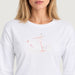 Fera women's Martini Run Tee in White, close-up showing fabric and design.