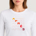 Fera women's Shades of Apres Tee in White, close-up showing fabric and design.