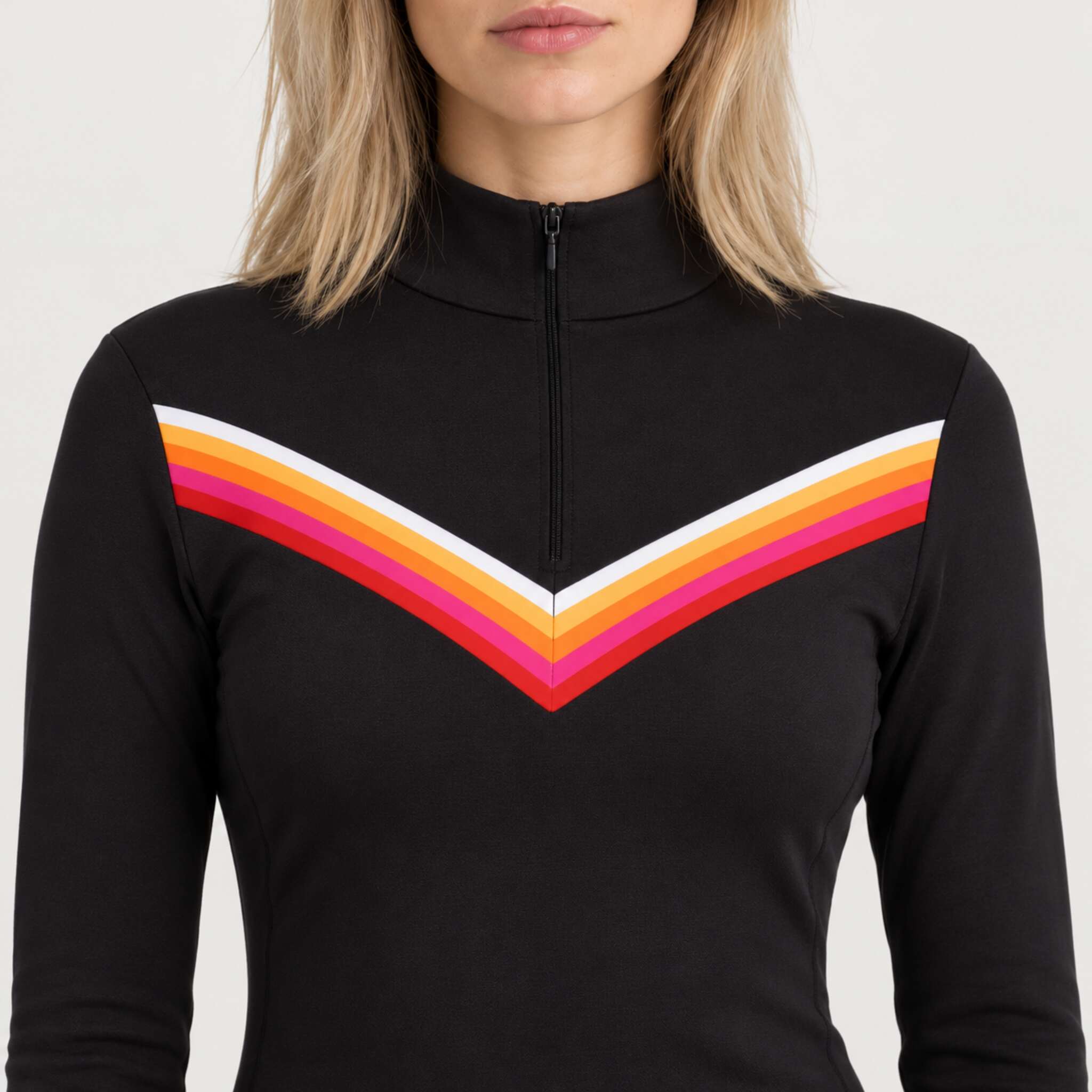Fera women's Velocity Half Zip in Black, close-up showing fabric and design.