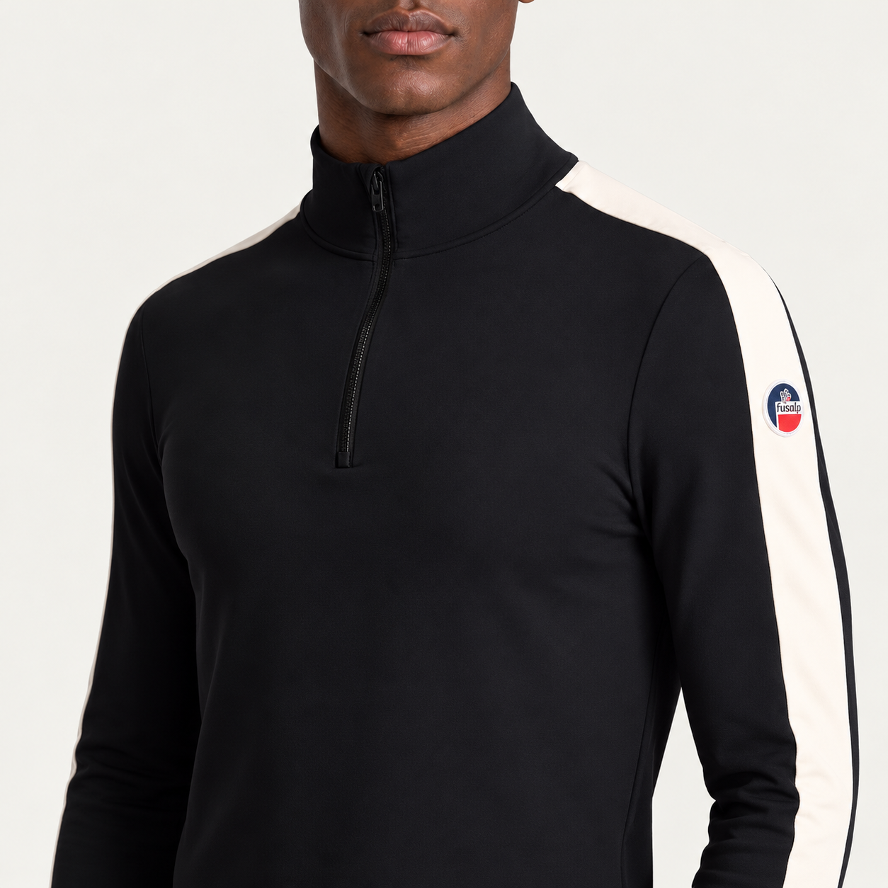 Fusalp men's Alpille IV Midlayer in Black, close-up of fabric and design.