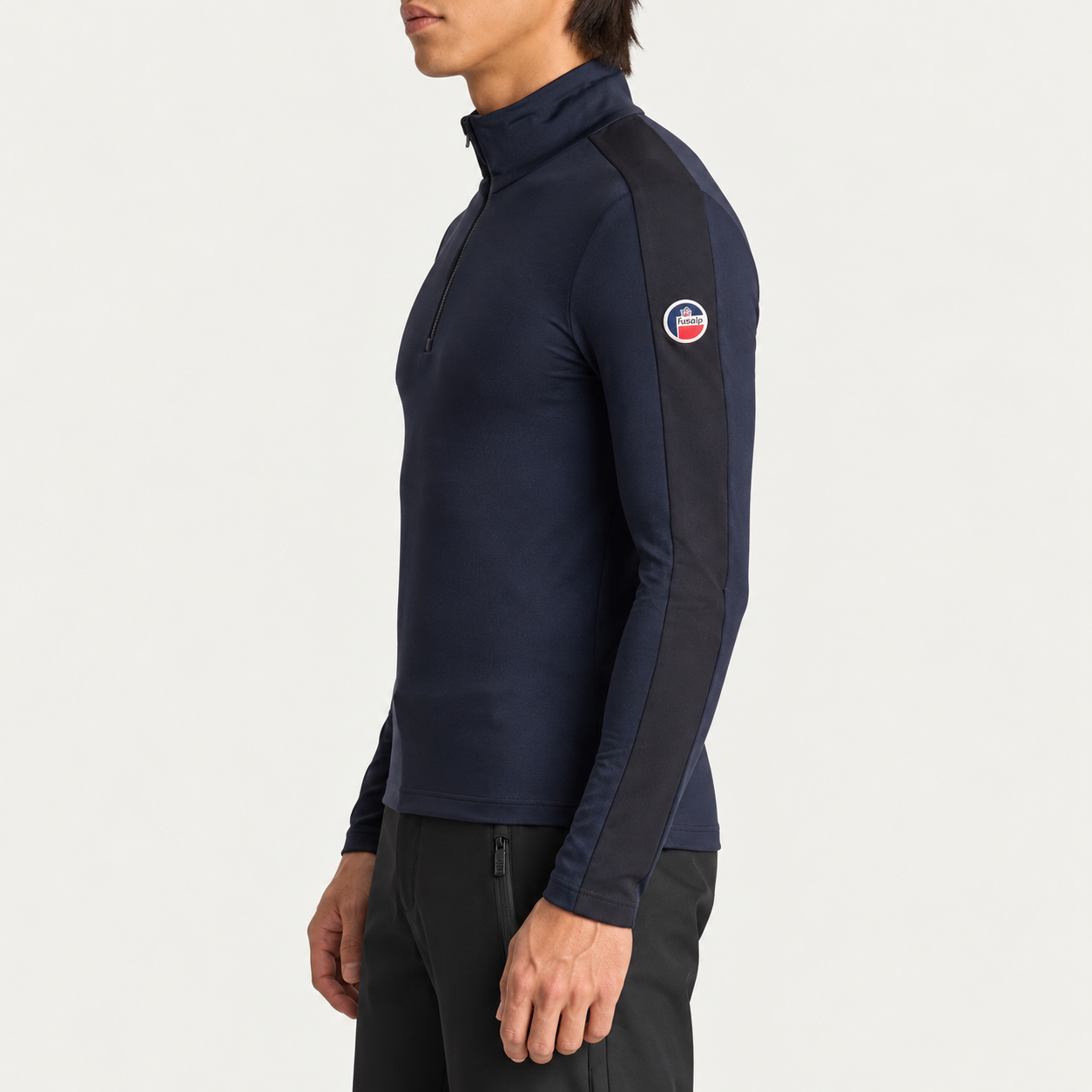 Fusalp men's Alpille IV Midlayer in Navy, side view on model.