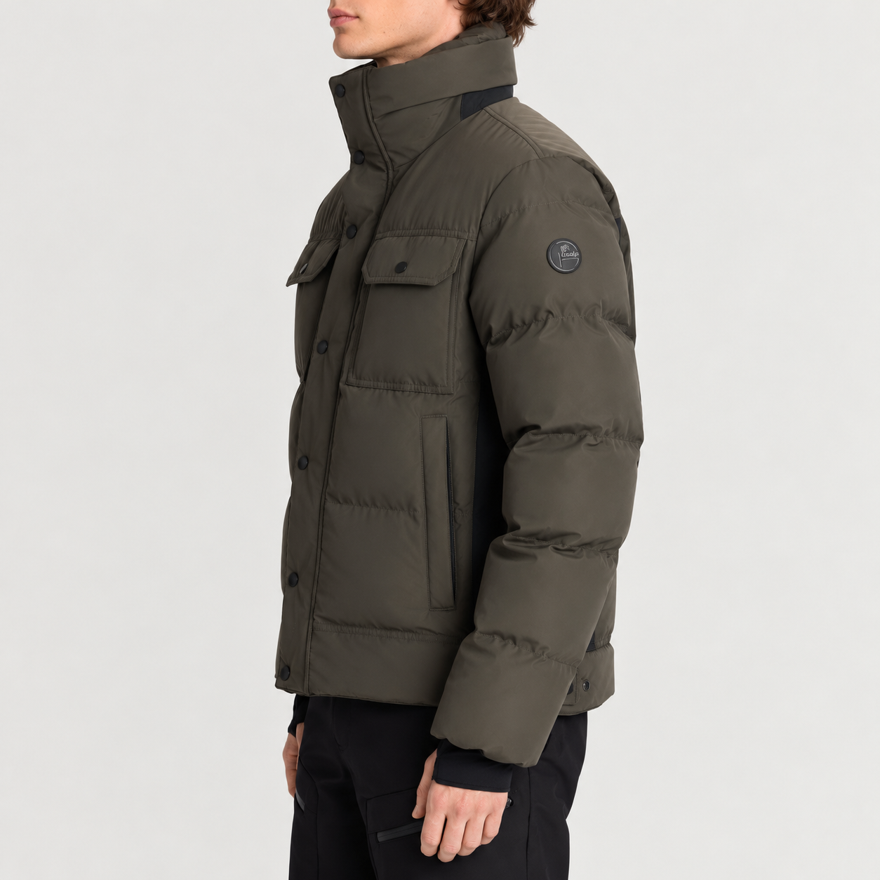 Fusalp men's Carlo Ski Jacket in Grove/Black, side view on model.