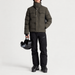 Fusalp men's Carlo Ski Jacket in Grove/Black, full outfit on model holding a ski helmet.