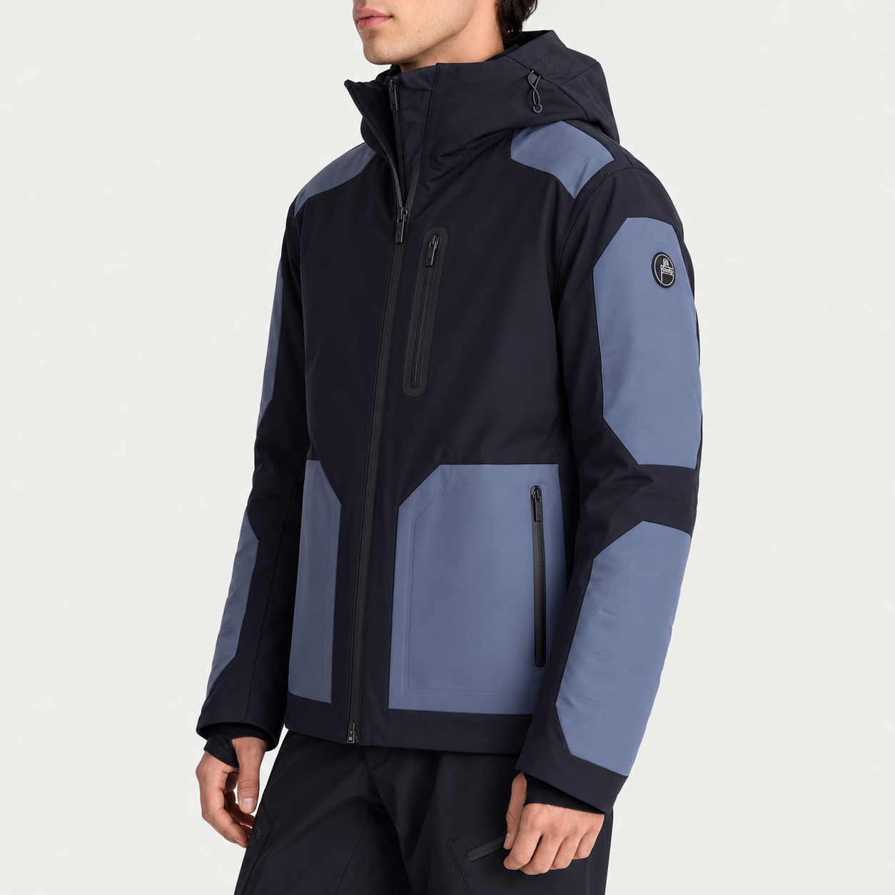 Fusalp men's Lirsan Ski Jacket in Black/Grey Sea, side view on model.