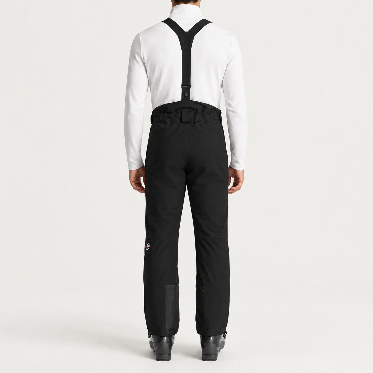 Fusalp men's Tomaso Ski Pants in Black, back view on model.