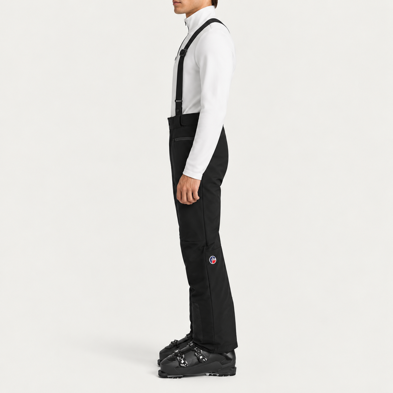Fusalp men's Tomaso Ski Pants in Black, side view on model.