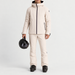 Fusalp men's Yohan Ski Jacket in Mastic, full outfit on model holding a ski helmet.