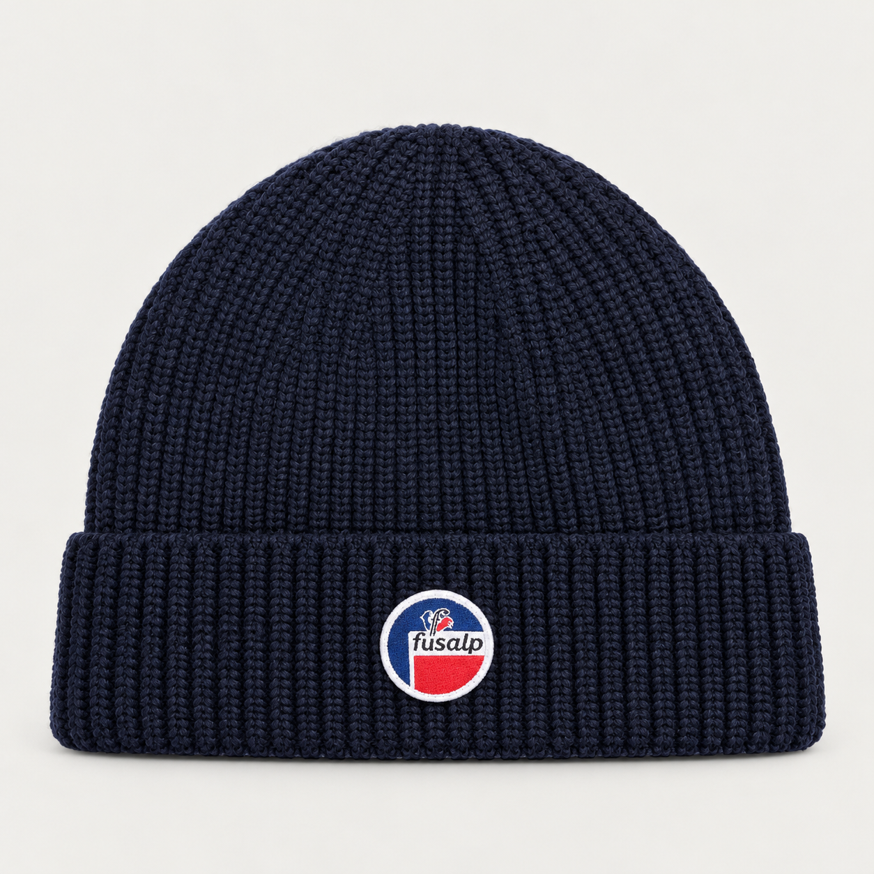 Fusalp unisex Cosmic Beanie in Navy, product view showing knit texture and branding.