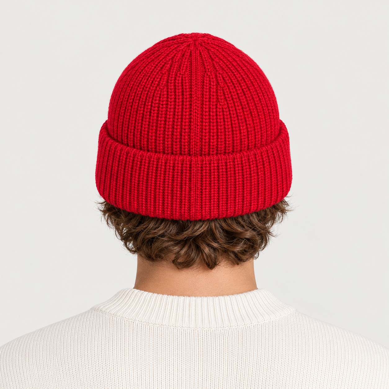 Fusalp unisex Cosmic Beanie in Red, view on male model.