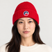 Fusalp unisex Cosmic Beanie in Red, front view on female model.