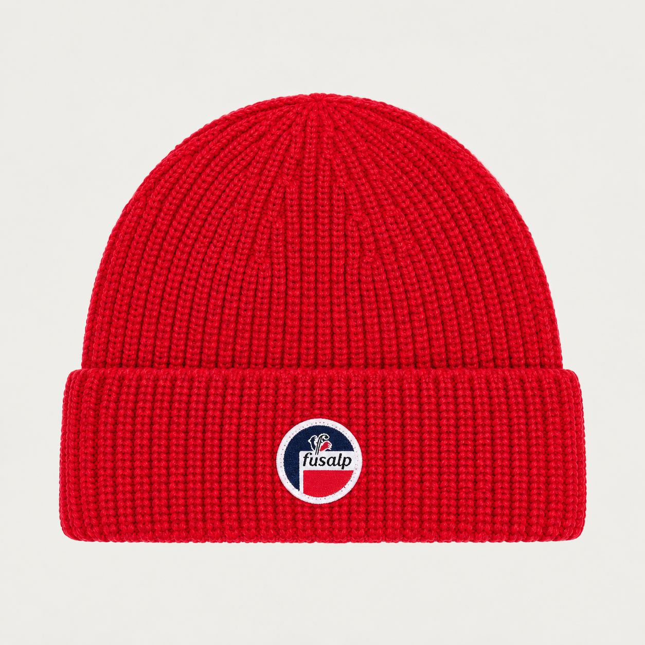 Fusalp unisex Cosmic Beanie in Red, product view showing knit texture and branding.