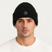 Fusalp unisex Knit II Beanie in Black, front view on male model.