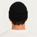 Fusalp unisex Knit II Beanie in Black, view on male model.