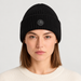Fusalp unisex Knit II Beanie in Black, front view on female model.