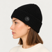 Fusalp unisex Knit II Beanie in Black, view on female model.