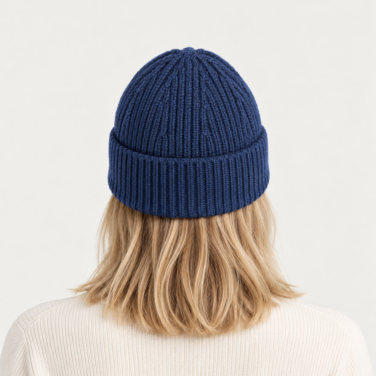 Fusalp unisex Knit II Beanie in Sea Blue, view on female model.
