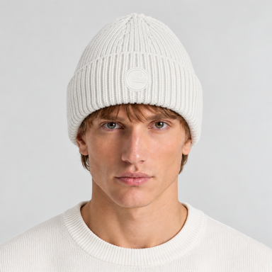 Fusalp unisex Knit II Beanie in White, front view on male model.