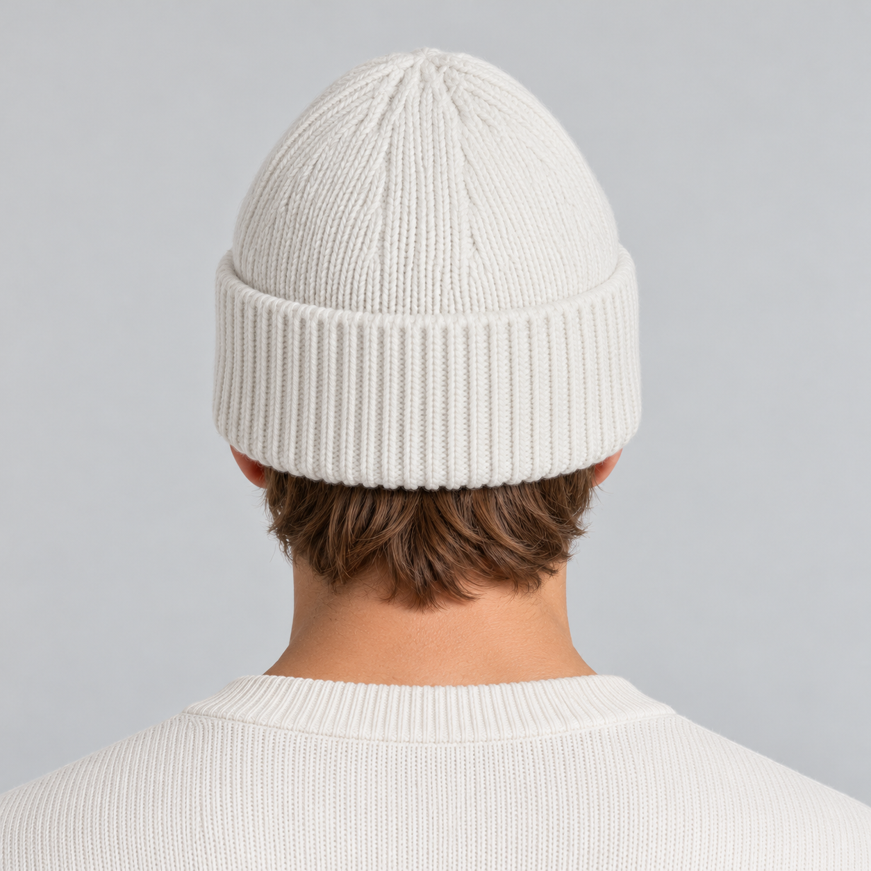 Fusalp unisex Knit II Beanie in White, view on male model.