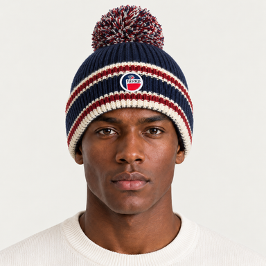 Fusalp unisex Pompon Beanie in Marin, front view on male model.