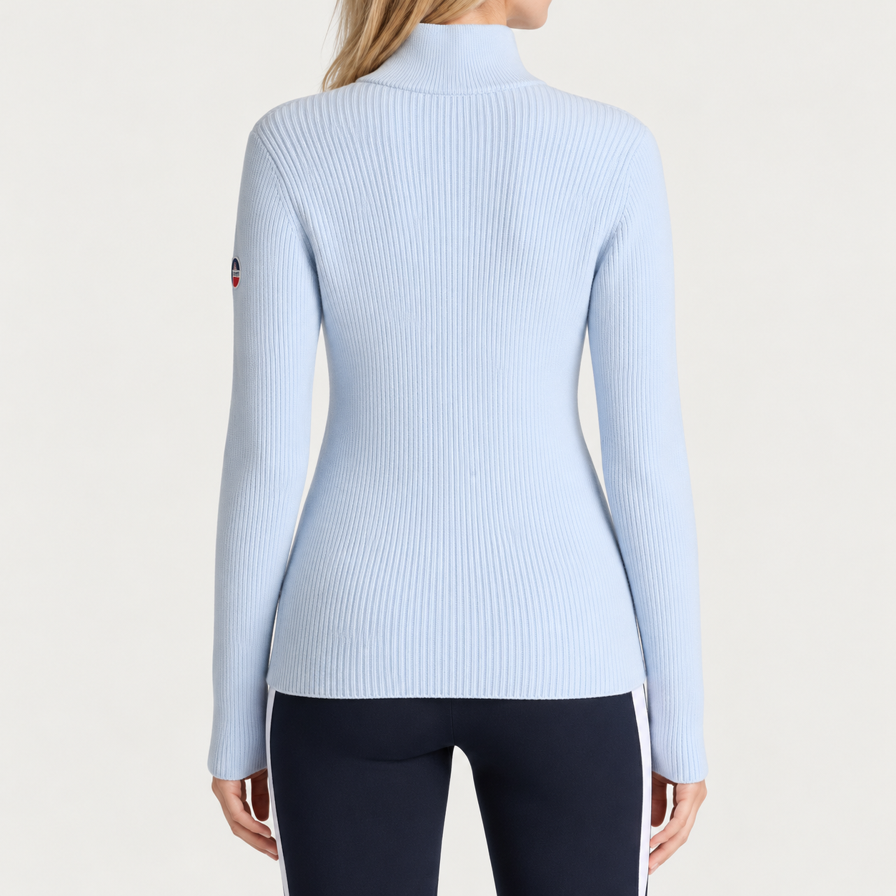 Fusalp women's Andromede Sweater in Cloud Blue, back view on model.