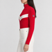 Fusalp women's Andromede Sweater in Racing Red, side view on model.