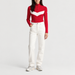 Fusalp women's Andromede Sweater in Racing Red, full outfit on model.