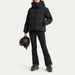 Fusalp women's Barsy II Ski Jacket in Black, full outfit on model holding a ski helmet.