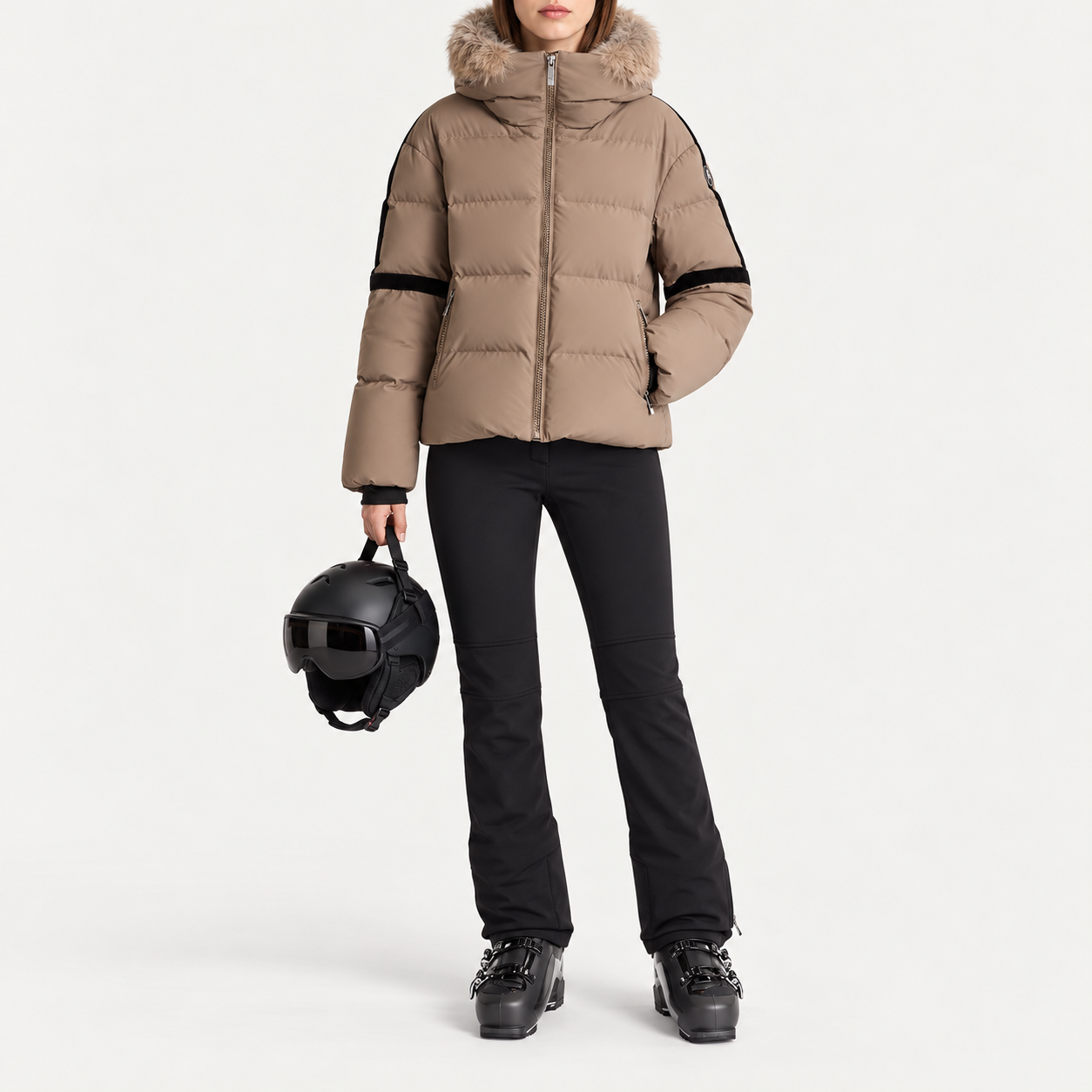 Fusalp women's Barsy II Ski Jacket in Falcon, full outfit on model holding a ski helmet.