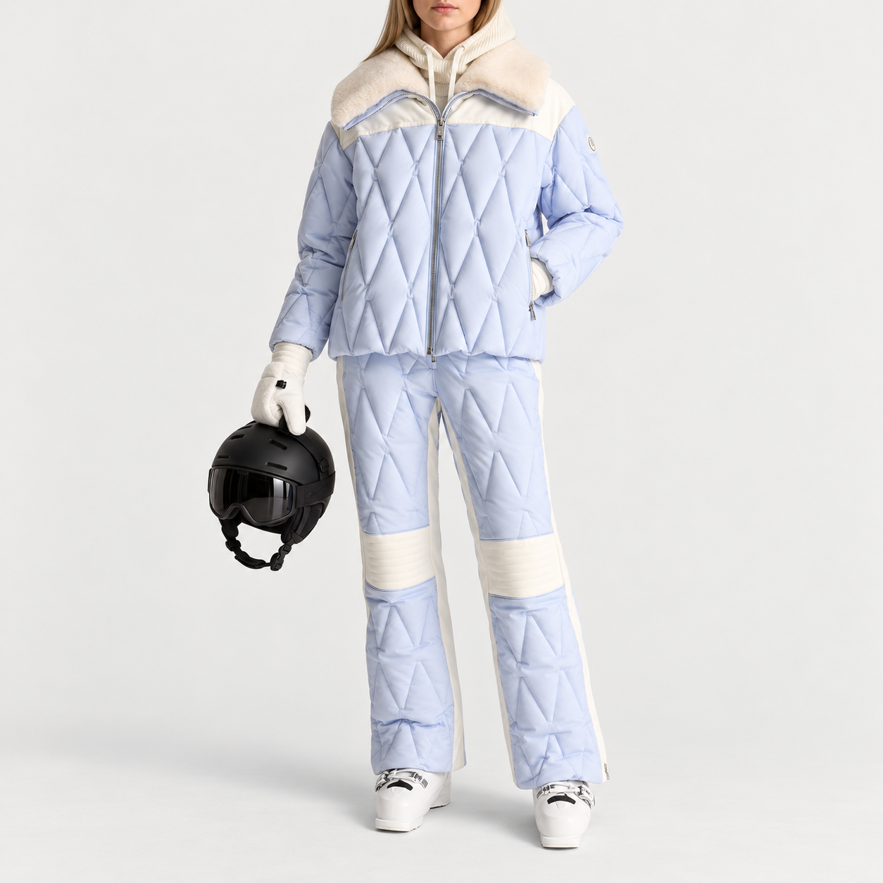Fusalp women's Beqya Ski Jacket in Nuage, full outfit on model holding a ski helmet.