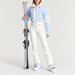 Clarisse Ski Suit in Cloud Blue — natural ski pose