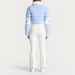 Fusalp women's Clarisse Ski Suit in Cloud Blue, back view on model.