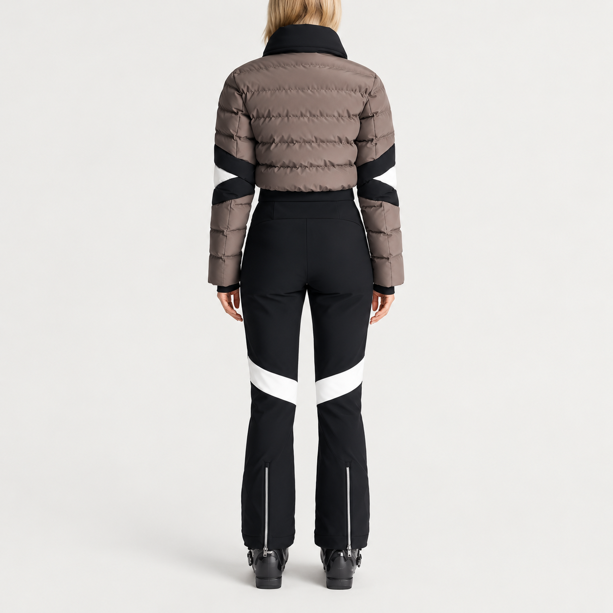 Fusalp women's Clarisse Ski Suit in Falcon/Black, back view on model.