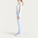 Fusalp women's Diana Ski Pants in Cloud Blue, side view on model.