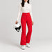 Diana Ski Pants in Racing Red — helmet pose