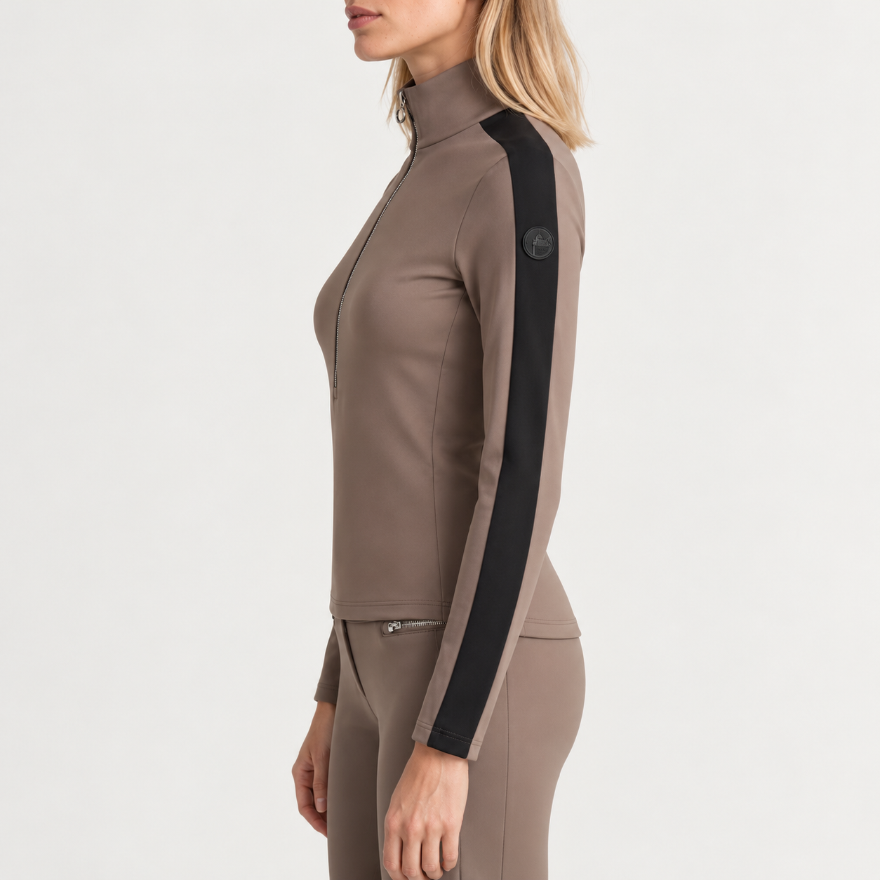 Fusalp women's Negam Midlayer in Falcon, side view on model.