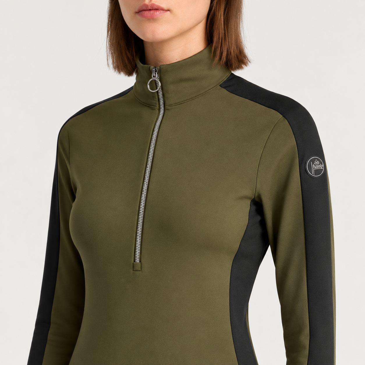 Fusalp women's Negam Midlayer in Moss Green, close-up of fabric and design.